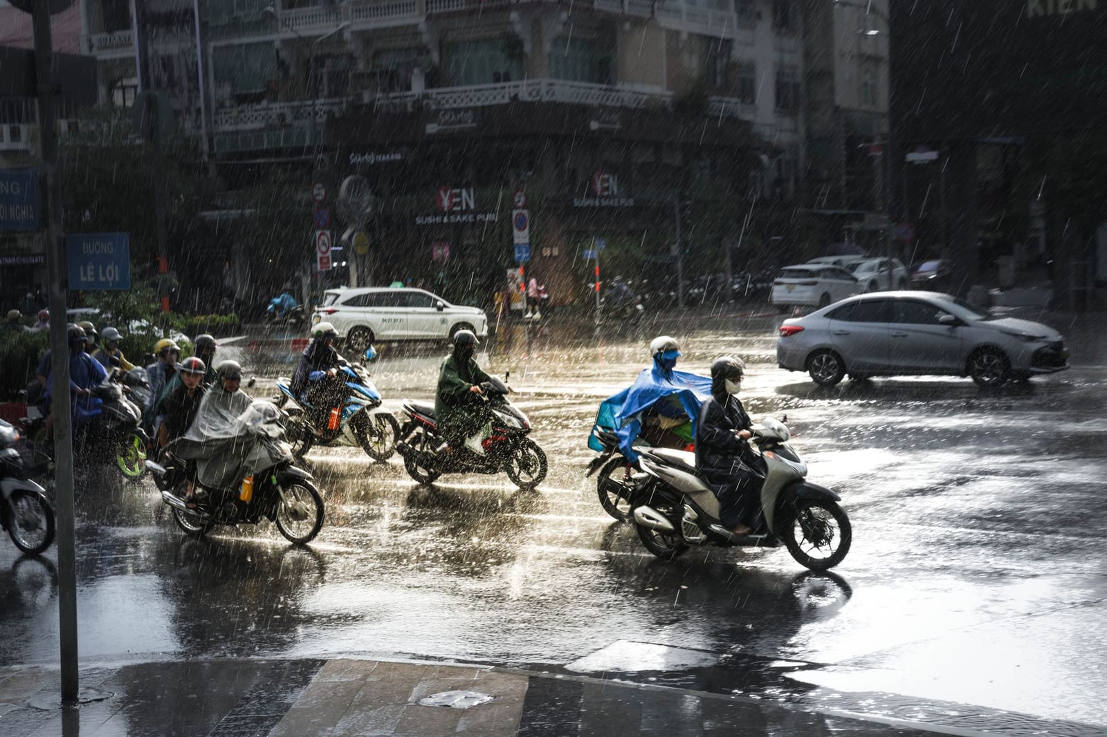 Heavy tropical rain on a Vietnamese street during the wet season