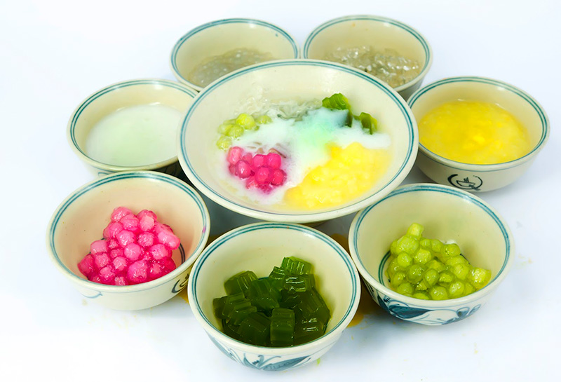 Close-up of the jelly, red tapioca 'pomegranate' pearls and white beans that make up the dessert.