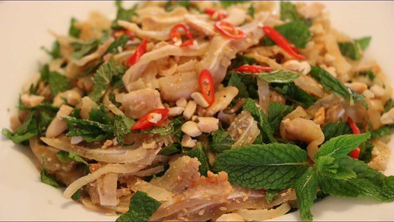 Tré trộn — shredded tré tossed with fresh herbs, chili and crushed peanuts.