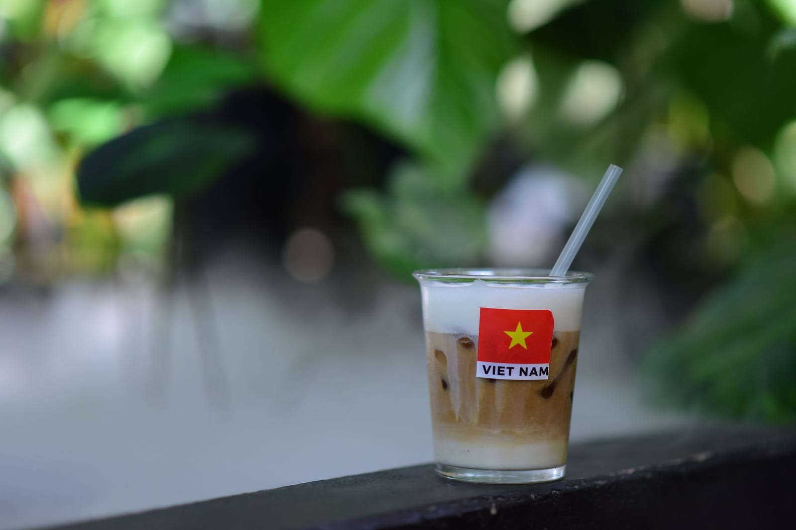 Vietnamese salt coffee (cà phê muối) with a layer of lightly salted cream on top, served iced.