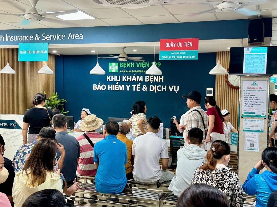 A crowded hospital waiting area — public hospitals are cheaper but busier