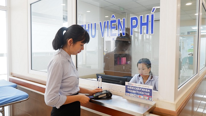 A hospital cashier and registration counter where patients pay before seeing the doctor