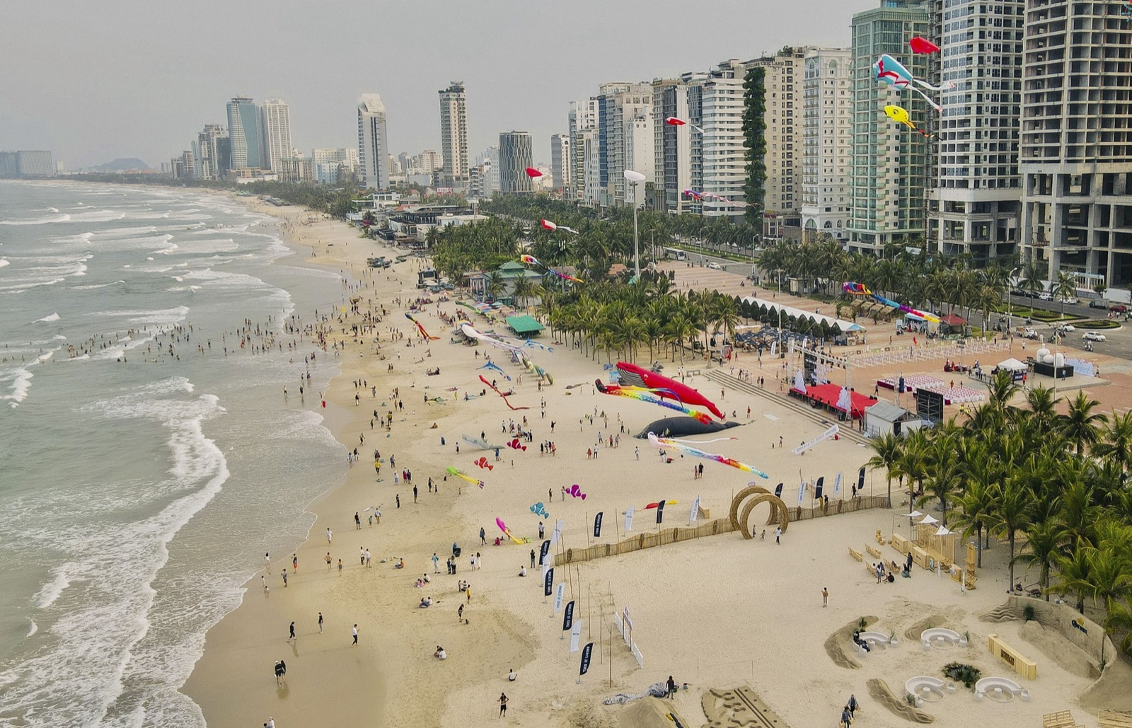 Aerial view of My Khe Beach in Da Nang, with the seafront high-rises and beachfront promenade.
