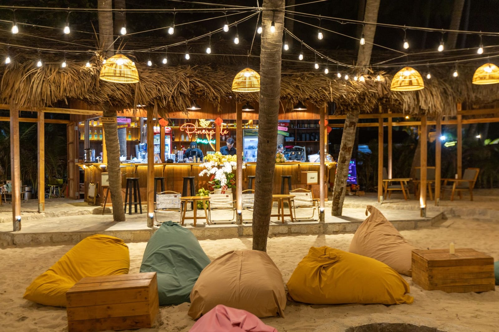 Cocktails and string lights at a beachfront bar near My Khe.