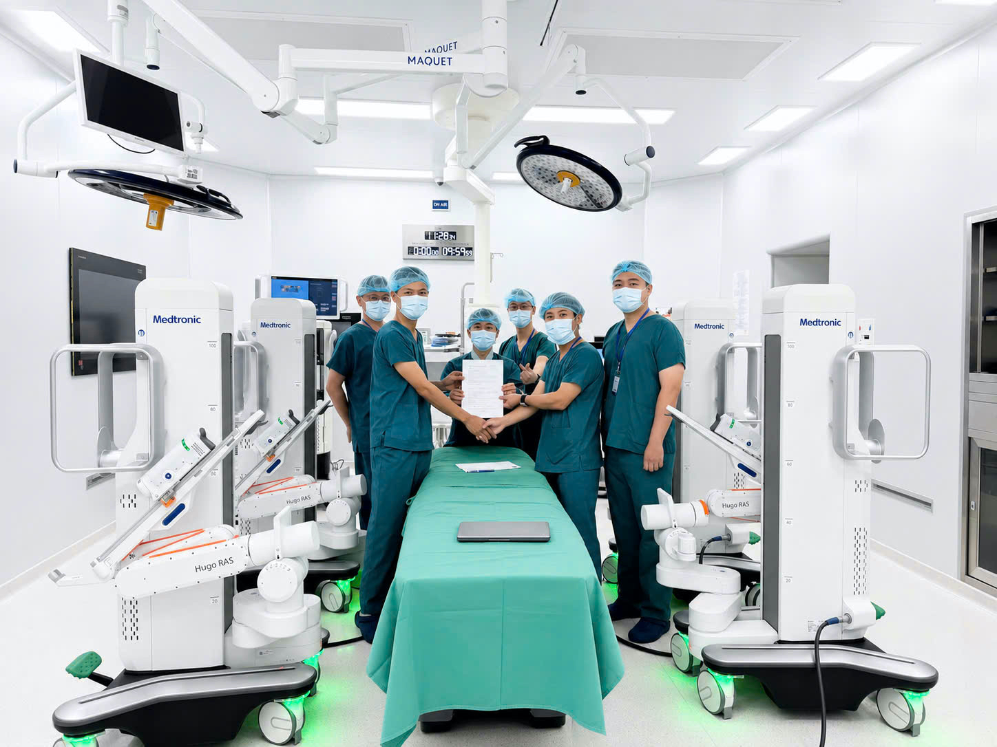 The surgical team at Vinmec Da Nang with two Hugo RAS robotic surgical systems in the operating room, part of the hospital's July 2026 robotic surgery center launch