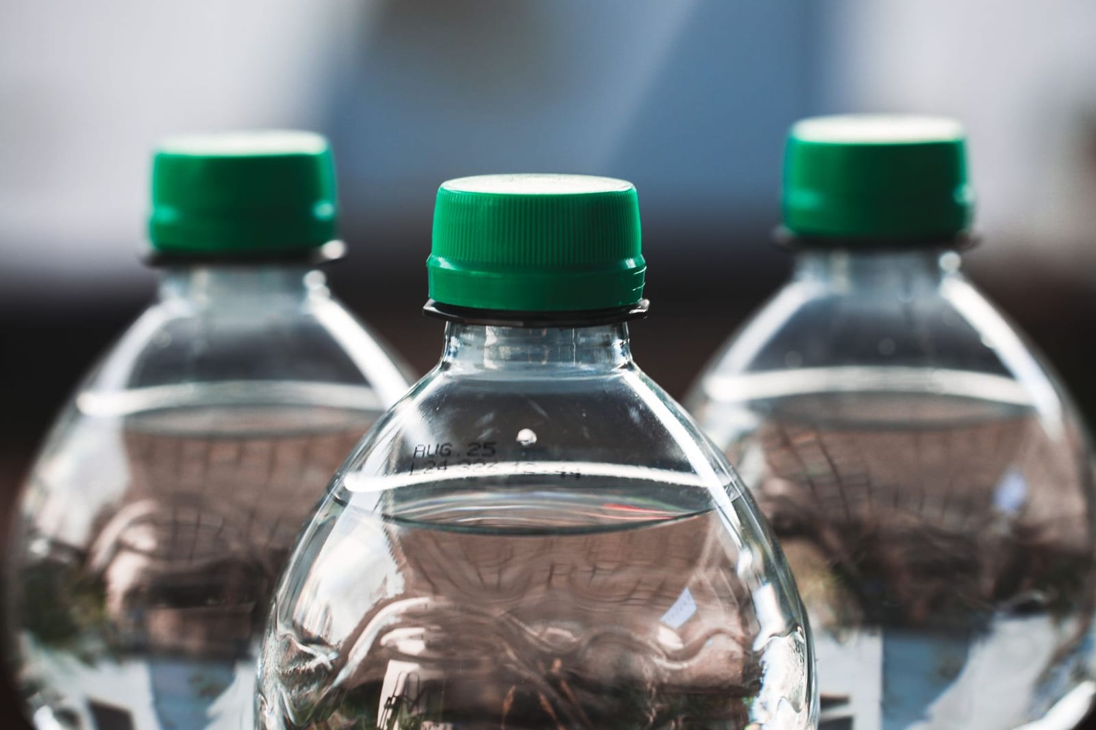Bottles of drinking water on a shop shelf — the easy, cheap safe option in Vietnam.