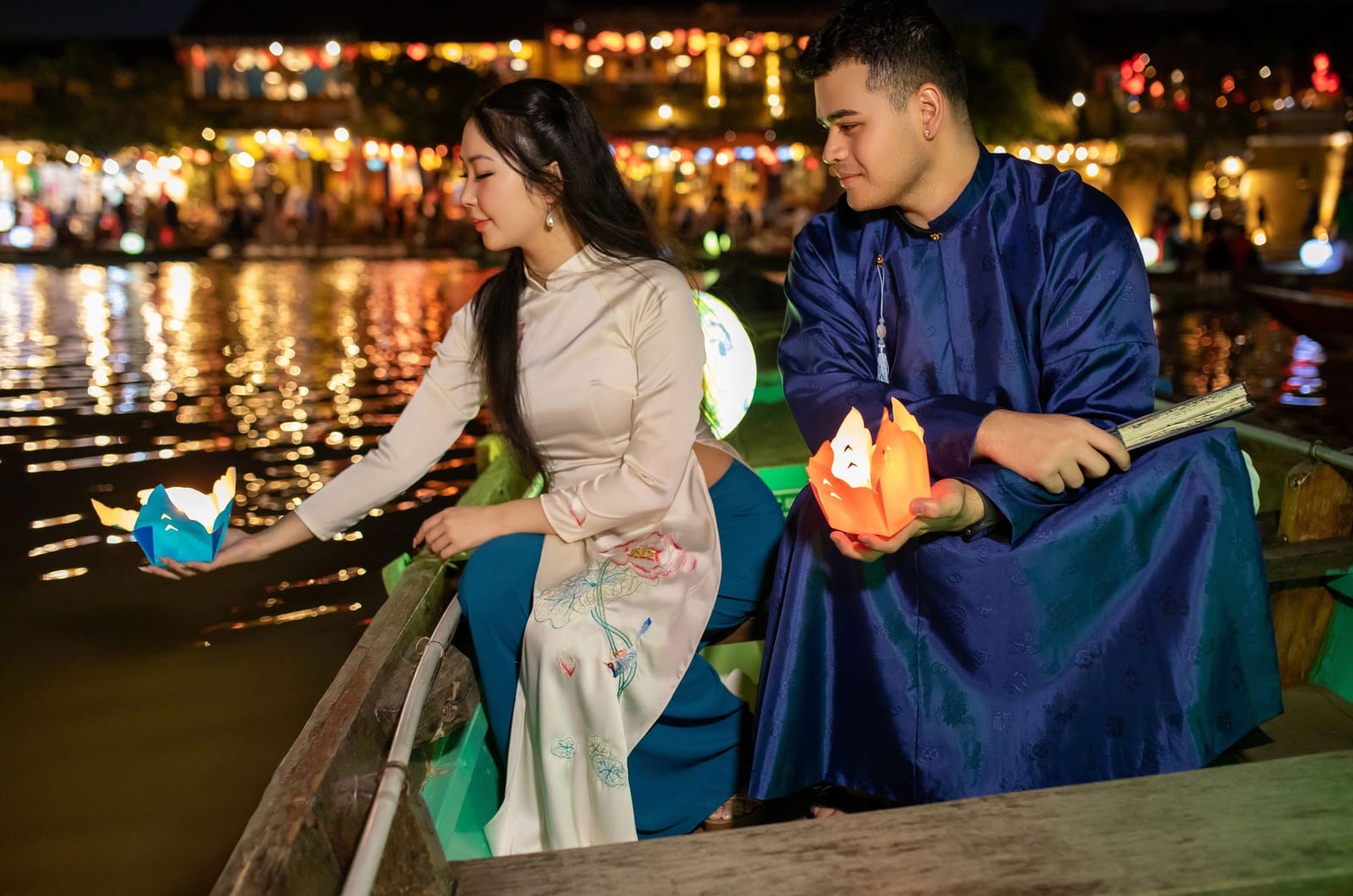 Candle-lit floating lanterns released on the Hoài River during the Hội An lantern festival